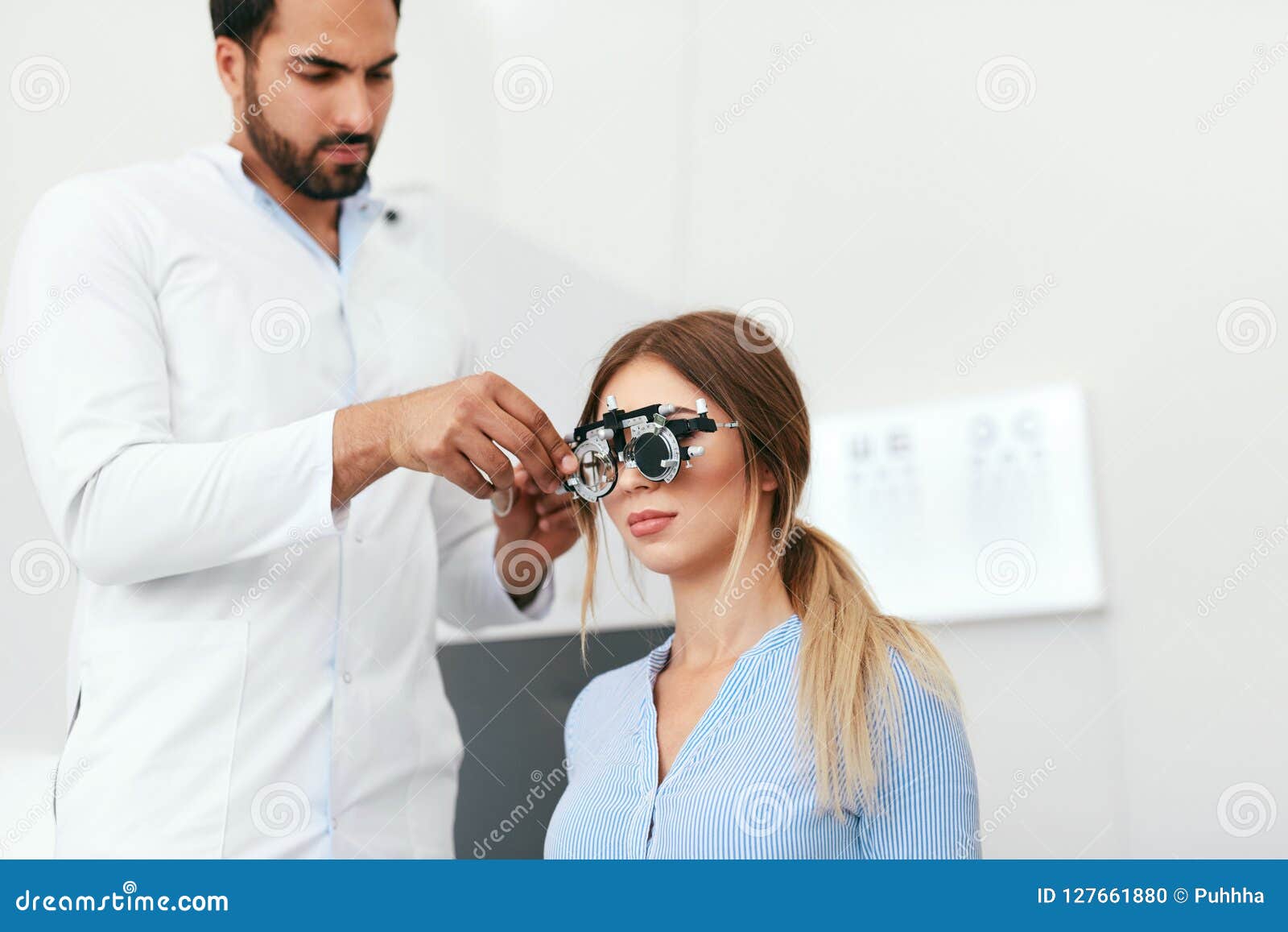 Optometry Test Eye Doctor Checking Woman Eyesight At Clinic Stock Optometry Test Eye Doctor Checking Woman Eyesight At Clinic Stock